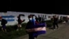 Miembros de una caravana de migrantes inician su viaje con la esperanza de llegar a Estados Unidos, en San Pedro Sula, Honduras, el 15 de enero de 2022.