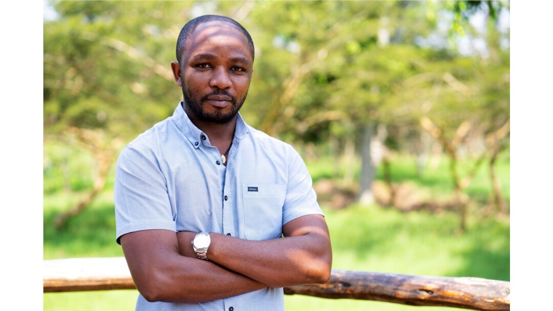Rwandan veterinarian Olivier Nsengimana is at the Umusambi Village, a place for endangered grey crowned cranes in Kigali, Rwanda June 21, 2021. (REUTERS/Cedric Karemangingo)