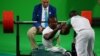 FILE - Roland Ezuruike of Nigeria reacts during the men's Paralympic Powerlifting competition, Rio de Janeiro, Brazil, Sept. 9, 2016. 