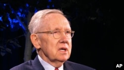FILE - kiongozi wa zamani wa walio wengi katika Baraza la Seneti Harry Reid akitoa mhadhara Chuo Kikuu cha Nevada, Reno, Aprili 3, 2018. (AP Photo/Scott Sonner)