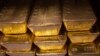 Twenty four karat gold bars are seen at the United States West Point Mint facility in West Point, New York, June 5, 2013. 