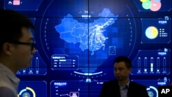 在北京舉行的全球移動互聯網大會上一幅電子數據顯示的中國地圖。 （2018年7月11日）