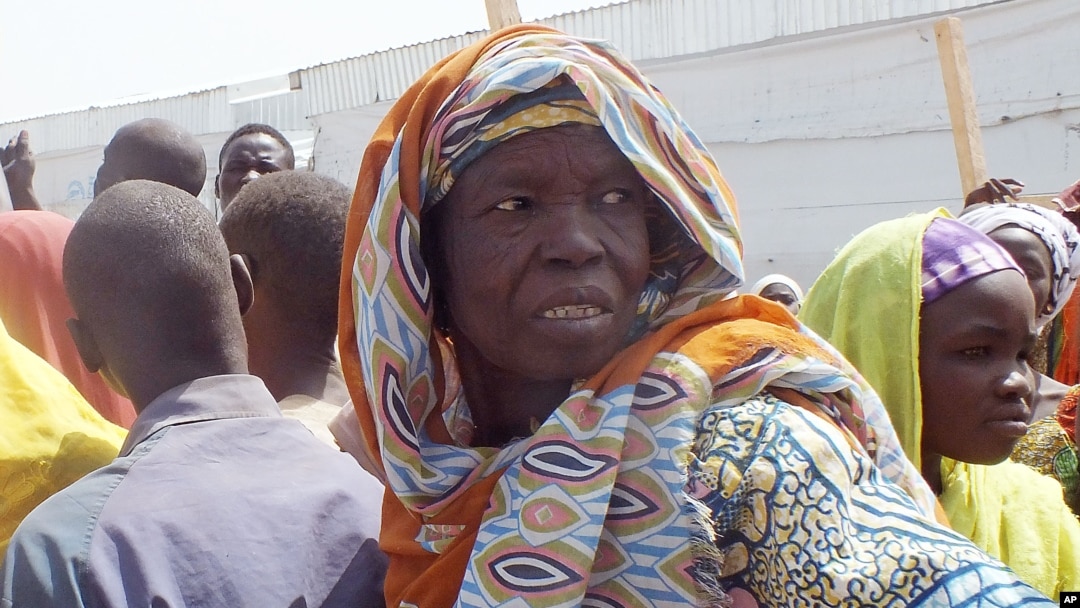 FILE - An old woman, who fled her home due to violence from the Islamic extremists group Boko Haram, is seen inside a refugee camp in Minawao, Cameroon, Feb. 25, 2015. 