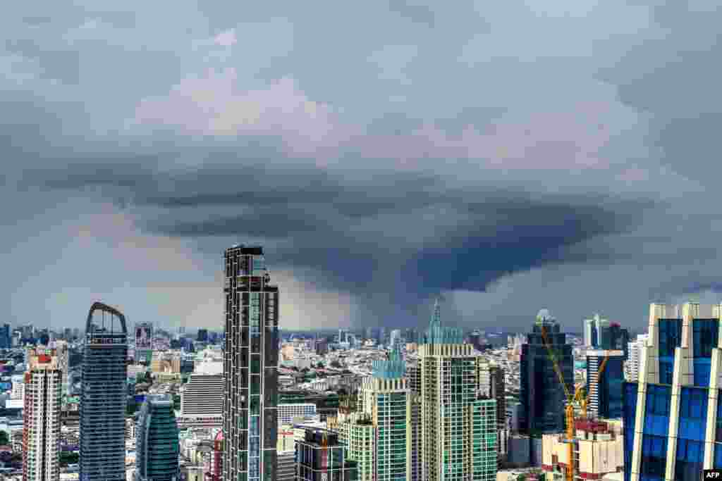 A cumulonimbus cloud is seen over Bangkok's skyline, Thailand.