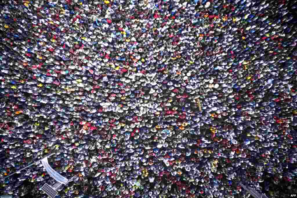 An aerial view shows protesters gathering for a demonstration against Malian president Ibrahim Boubacar Keïta and his government, in the Independence square in Bamako, Mali.
