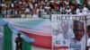 FILE - A soldier stands guard during a launch campaign by the ruling All Progressives Congress (APC) party for President Muhammadu Buhari's re-election bid, in Uyo, Nigeria, Dec. 28, 2018.