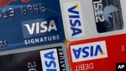 Visa llegó a un acuerdo tentativo con comercios minoristas en 2012, pero Wal-Mart se mantuvo al margen.