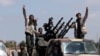 Libyan National Army (LNA) members, commanded by Khalifa Haftar, head out of Benghazi to reinforce the troops advancing to Tripoli, in Benghazi, Libya, April 7, 2019. 