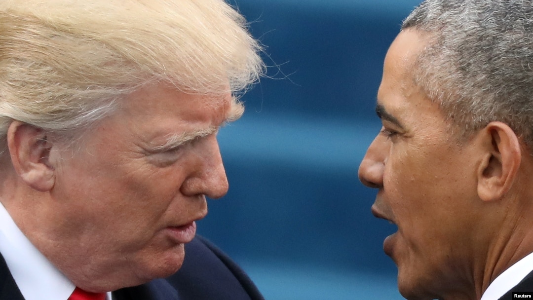 FILE - U.S. President Barack Obama, right, greets President-elect Donald Trump at inauguration ceremonies swearing in Trump as president on the West front of the U.S. Capitol in Washington, Jan. 20, 2017.