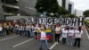 ARCHIVO - Venezolanos exigen respeto a los DDHH durante una protesta.