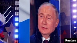 Портрет Путина на одном из митингов