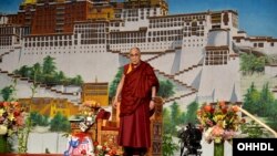 His Holiness the Dalai Lama speaking to members of the Tibetan community