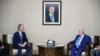 FILE - In this photo released by the Syrian official news agency SANA, the U.N.'s special envoy for Syria Geir Pedersen, left, meets with Syrian Foreign Minister Walid al-Moallem, in Damascus, Syria, Sept. 23, 2019. 