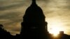 FILE - The sun rises over the U.S. Capitol in Washington, Sept. 24, 2013. 