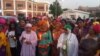 Nigerian women participate in a candlelight procession to remember victims of sexual violence in Abuja, Nigeria, Nov. 25, 2019. (Timothy Obiezu/VOA)