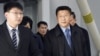 FILE - Kim Hyok Chol, right, who is leading negotiations with the United States, arrives at Beijing's international airport on his way to the Vietnamese capital Hanoi, Feb. 19, 2019. Analysts say reports of his execution may be exaggerated.