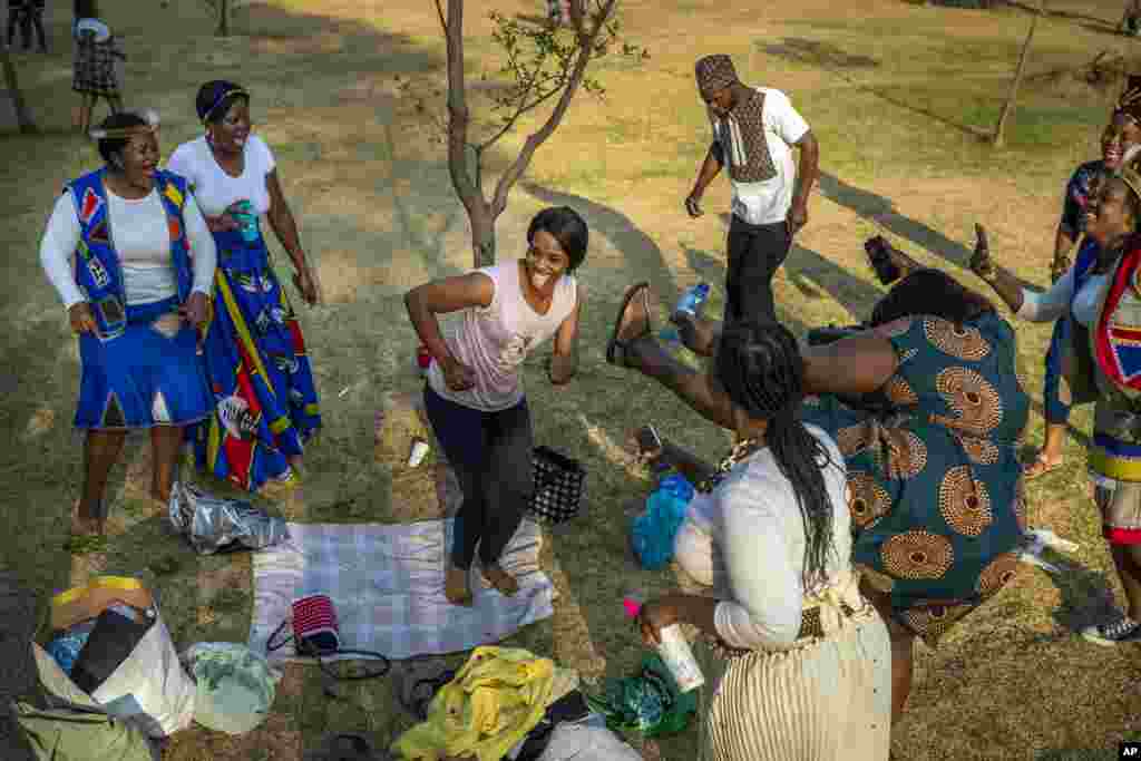 People celebrate South Africa's Heritage Day at Zoo Lake park in Johannesburg.