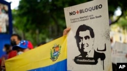 Imagem de Alex Saab num cartaz em Caracas, Venezuela