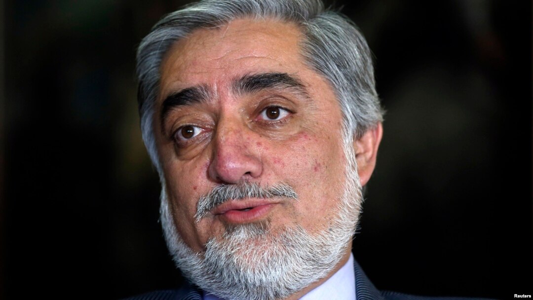 Former Afghan foreign minister Abdullah Abdullah speaks during an interview in Kabul April 13, 2014.