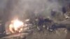 Imagen tomada por video proporcionado por el ministerio de Defensa ruso, que muestra el bombardeo de un avión Su-34M sobre la ciudad de Aleppo, en el norte de Siria.
