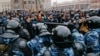 People clash with police during a protest against the jailing of opposition leader Alexei Navalny in Moscow, Jan. 31, 2021. 