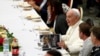 Pope Francis attends a lunch with the poor after celebrating a Mass marking the Roman Catholic Church's World Day of the Poor, in Paul VI Hall at the Vatican, Nov. 17, 2019. 