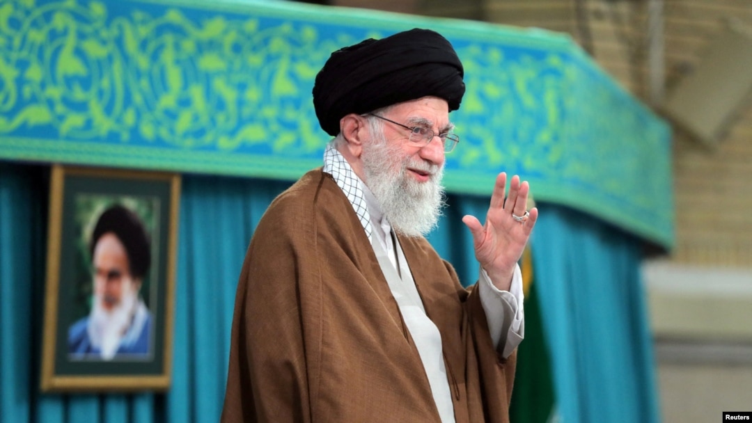 Iran's Supreme Leader Ayatollah Ali Khamenei waves during a meeting in Tehran, Iran, Oct. 27, 2024. (West Asia News Agency/Handout via Reuters)