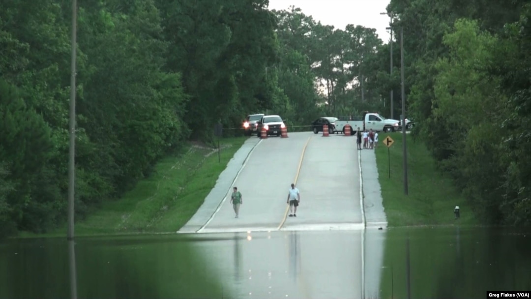 A number of streets in the Houston, Texas, area have been closed by flooding, including Flintridge Street in The Woodlands, just north of Houston, May 28, 2016. 