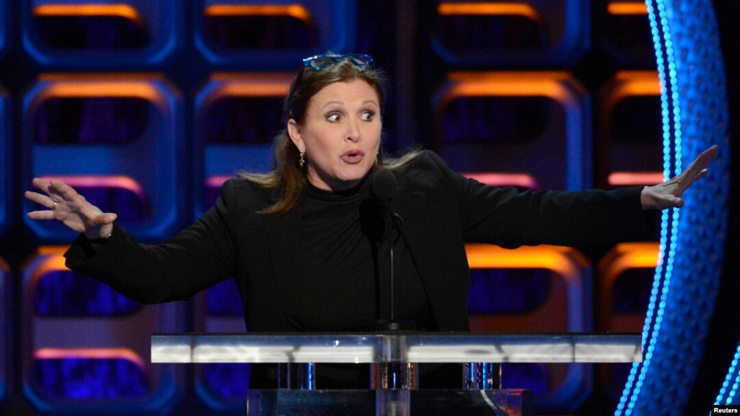 FILE - Carrie Fisher speaks during the taping of the Comedy Central Roast of Roseanne in Los Angeles, Aug. 4, 2012.