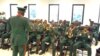 The National Assembly Guards Brigade performed Nigeria's national anthem and the U.N. anthem before the official reopening in Abuja. (Timothy Obiezu/VOA)