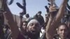 Libya's NTC Fighters Celebrate in Streets of Sirte