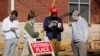 FILE - Voters line up at a polling station on Election Day in Charlotte, North Carolina, Nov. 3, 2020. 