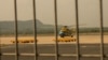 A helicopter takes off Tuesday from Vietnam's southwest Phu Quoc Island to search for the passengers of Malaysian Airlines flight MH370