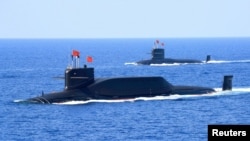 中國海軍094A晉級彈道導彈戰略核潛艇在南中國海參加軍事表演。（2018年4月12日）