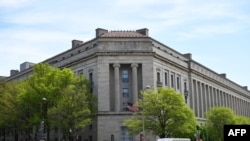 FILES - The Department of Justice in Washington, April 16, 2019.