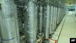FILE - This photo released Nov. 5, 2019, by the Atomic Energy Organization of Iran shows centrifugs in the Natanz uranium enrichment facility in central Iran.