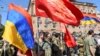 People attend a meeting to recruit military volunteers after Armenian authorities declared martial law and mobilised its male population following clashes with Azerbaijan over the breakaway Nagorno-Karabakh region in Yerevan, Armenia, Sept. 27, 2020.