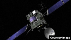 FILE - Artist view of the Rosetta spacecraft. Rosetta’s lander, Philae, is attached and is shown in blue (© ESA/J. Huart)