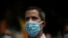 El líder opositor venezolano Juan Guaidó asiste a un mitin de manifestantes exigiendo una distribución más equitativa y rápida de las vacunas COVID-19, en Caracas, el 17 de abril de 2021.