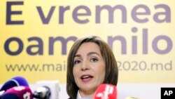 Former prime minister Maia Sandu speaks to media in Chisinau, Moldova, Nov. 16, 2020. Sandu won decisively Moldova's presidential runoff vote.