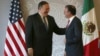 U.S. Secretary of State Mike Pompeo, left, and Mexican Foreign Minister Luis Videgaray smile after a press conference in Mexico City, July 13, 2018.
