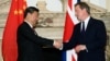 2015年10月21日，英國首相戴維·卡梅倫(右)在倫敦中英商業峰會上與中國國家主席習近平握手