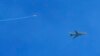 Activists: Syrian Air Strikes Kill 16 in Kurdish Village
