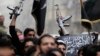 Shells Hit Key District of Syria's Aleppo, Civilians Flee
