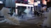 Tear gas engulf the streets of Hong Kong, Oct. 27, 2019. 
