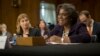 U.S. Assistant Secretary of State for African Affairs Linda Thomas-Greenfield, right, accompanied by USAID Assistant Administrator for Bureau for Democracy Conflict and Humanitarian Assistance Nancy Lindborg, testifies on Capitol Hill, Jan. 9, 2014, before the Senate Foreign Relations Committee hearing on situation in South Sudan. 