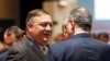 U.S. Secretary of State Mike Pompeo, left, speaks with Russia's Deputy Foreign Minister Igor Morgulov in Singapore, Aug. 4, 2018