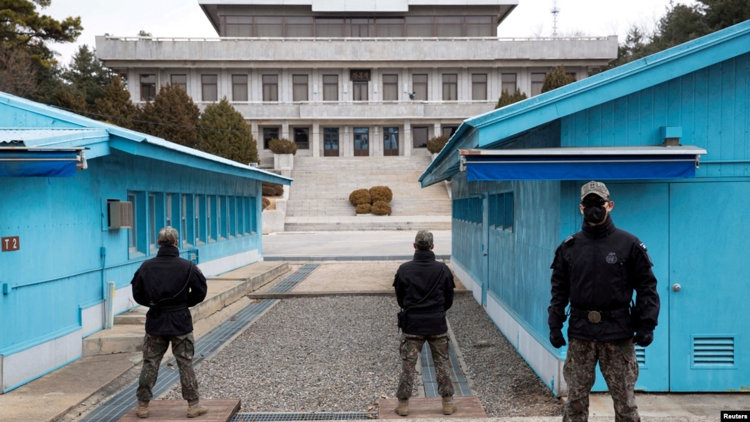 South Korean soldiers stand guard during a media tour at the Joint Security Area (JSA) on the Demilitarized Zone in the border village of Panmunjom in Paju, South Korea, March 3, 2023. 