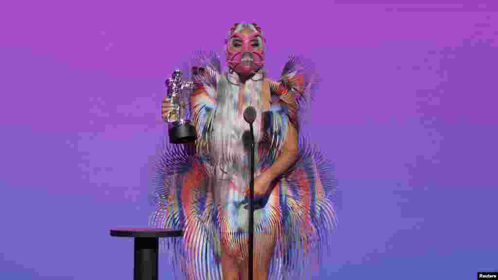 Lady Gaga accepts the award for Best Collaboration for "Rain On Me" during the 2020 MTV VMAs in this screen grab image made available on Aug. 30, 2020. (VIACOM/Handout)