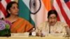 FILE - India's then-minister of commerce and industry, now minister of defense, Nirmala Sitharaman (L) and foreign minister Sushma Swaraj are seen at a U.S-India Strategic & Commercial Dialogue plenary session at the State Department, in Washington, Sept. 22, 2015.